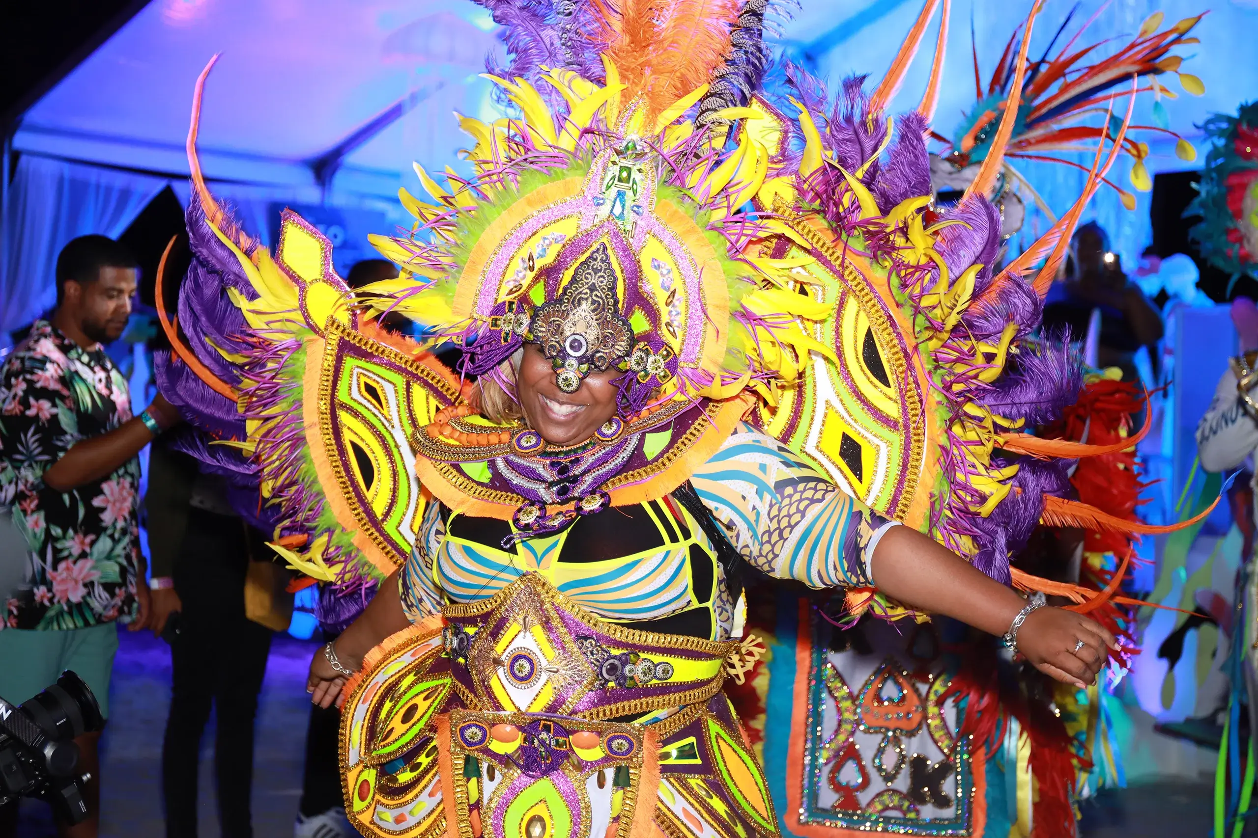 A woman dressed in Bahamas Junkanoo fashion dancing