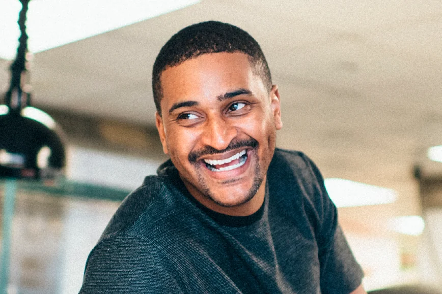 Chef JJ Johnson smiling in the Fieldtrip kitchen