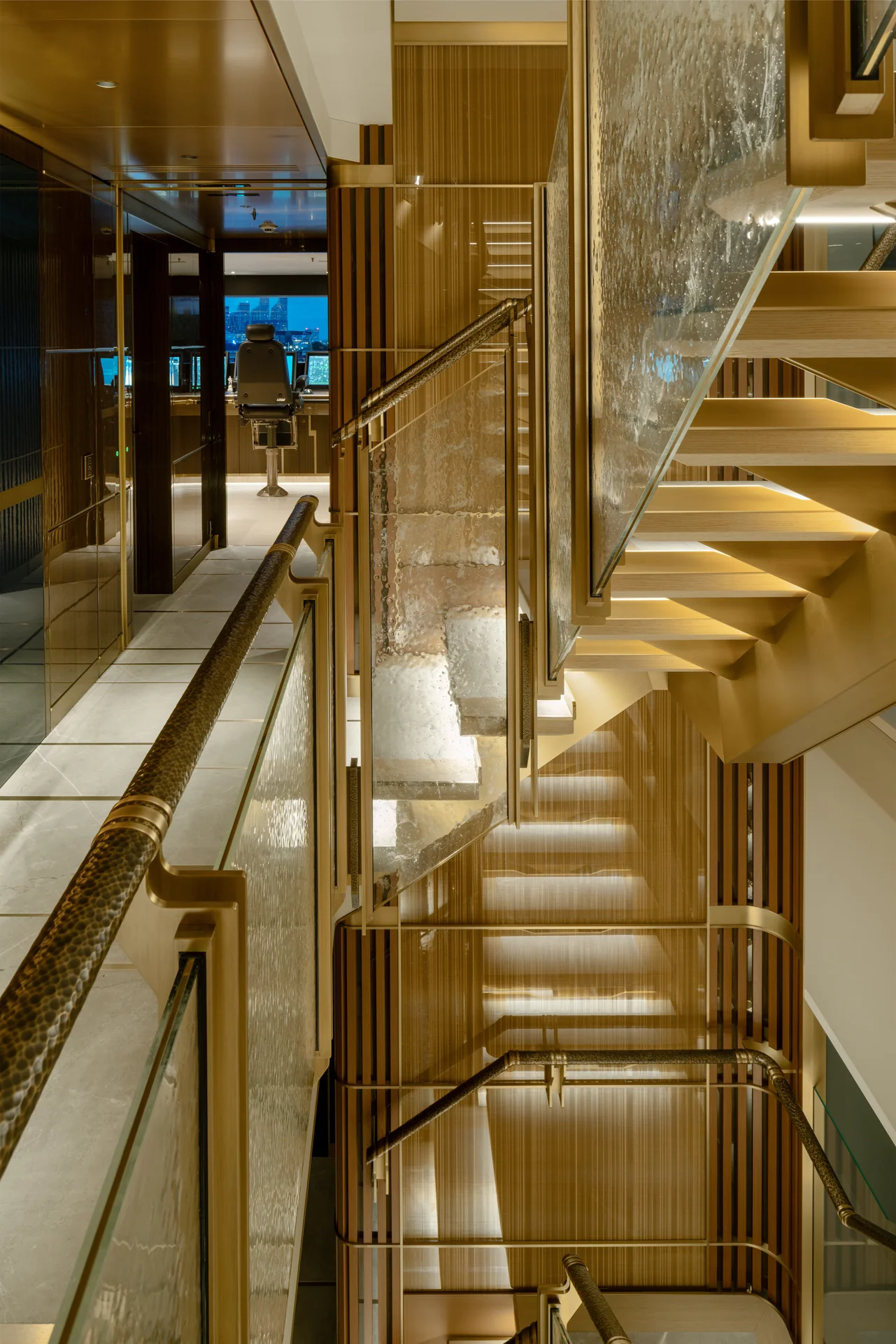 The four-level main staircase aboard the Feadship Valor